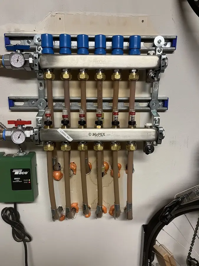 Plumber performing Gas Line Installation at a residential property in Cudahy